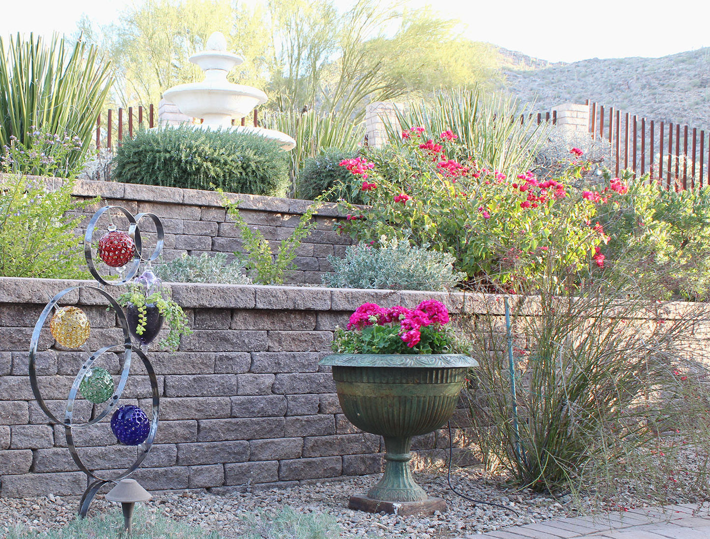4 Ring metal and borosilicate glass garden sculpture