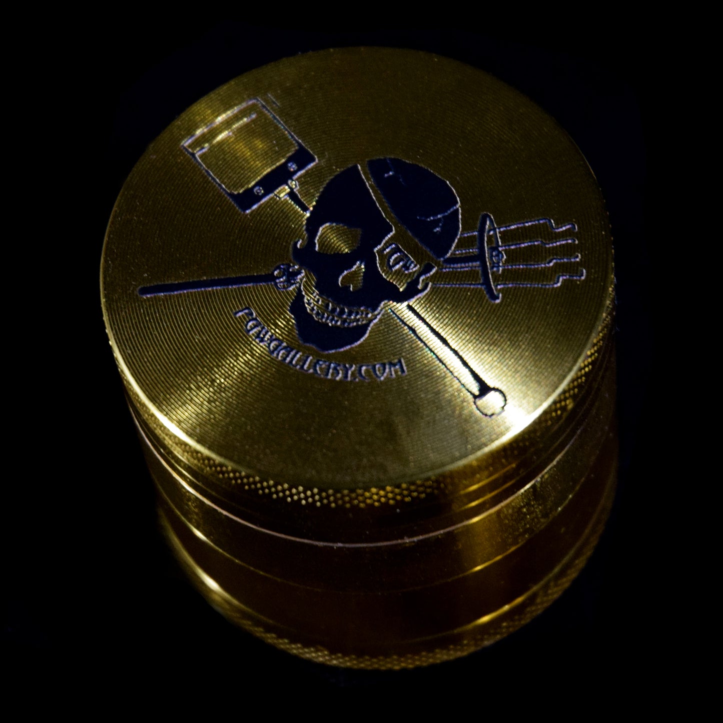 gold skull grinder