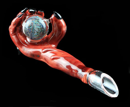 Devil's Right Hand holding a tie-dye marble, Concentrate Dabber Collab with Phil Sundling & Revlock Glass