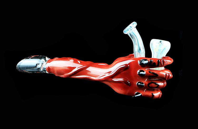 Devil's Right Hand holding a Sherlock Concentrate Dabber Collab with Phil Sundling & CK_Glass