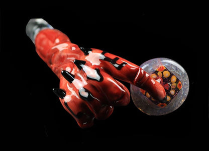 Devil's Right Hand holding a Millie Tile Concentrate Dabber Collab with Phil Sundling & Riel Glass