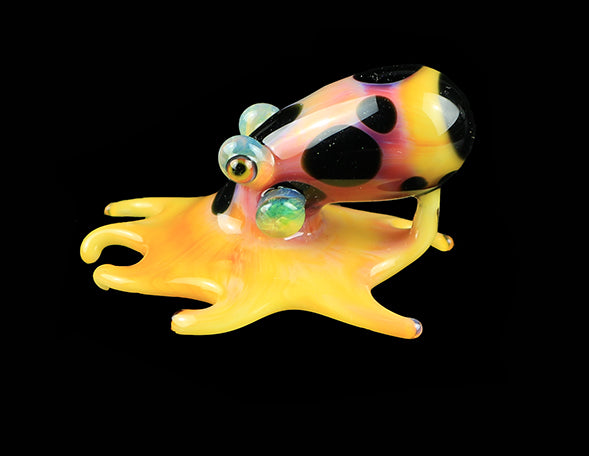 Yellow octopus pendant by, Burtoni