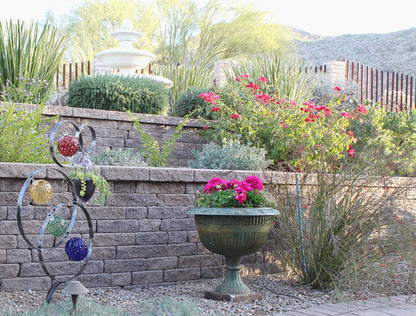 4 Ring metal and borosilicate glass garden sculpture