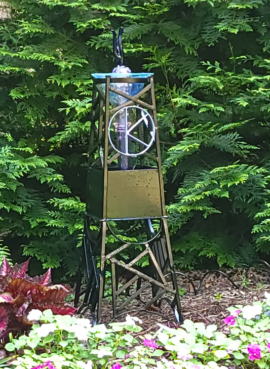 Steel and borosilicate garden fountain