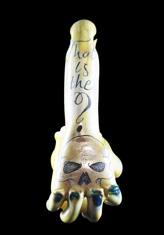 Hand holding white skull pendant by, Phil Sundling and Glass scribe