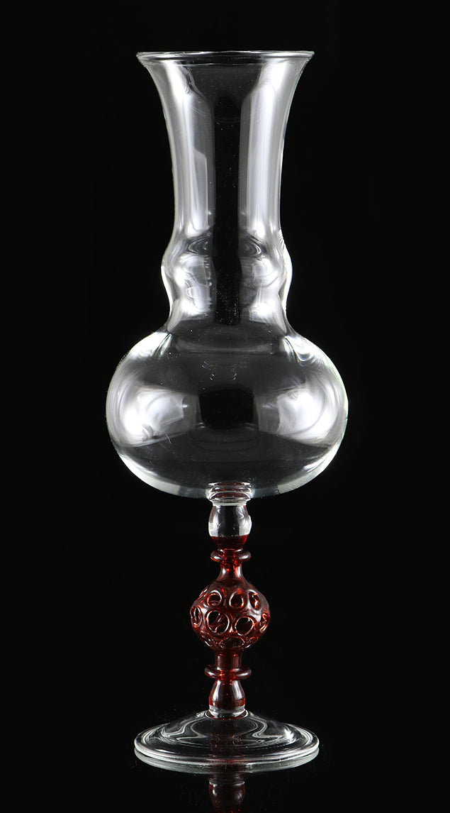 clear vase with red stem by, Phil Sundling