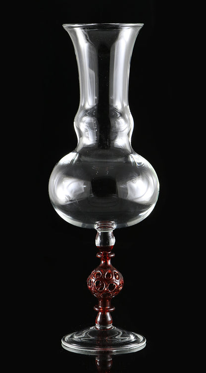 clear vase with red stem by, Phil Sundling