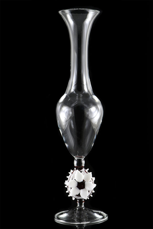 Clear vase with white flower and red accents by, Phil Sundling